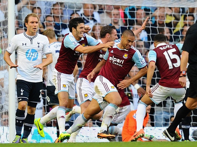 Winston Reid of West Ham celebrates scoring his side's first goal during the Barclays Premier League match between Tottenham Hotspur and West Ham United at White Hart Lane on October 6, 2013