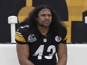 Pittsburgh's Troy Polamalu sits on the sidelines against San Diego on December 9, 2012