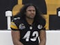 Pittsburgh's Troy Polamalu sits on the sidelines against San Diego on December 9, 2012