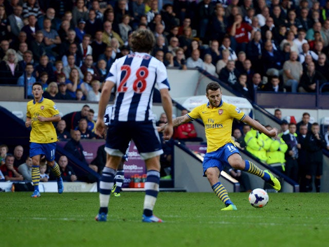 Jack Wilshere of Arsenal scores their first goal during the Barclays Premier League match between West Bromwich Albion and Arsenal at The Hawthorns on October 6, 2013