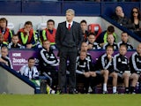 Arsene Wenger manager of Arsenal looks on from the touchline during the Barclays Premier League match between West Bromwich Albion and Arsenal at The Hawthorns on October 6, 2013
