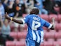 Emmerson Boyce celebrates after scoring the winning goal during the Sky Bet Championship match between Wigan Athletic and Blackburn Rovers at DW Stadium on October 6, 2013