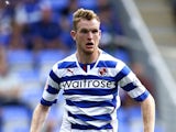 Alex Pearce of Reading in action during the Sky Bet Championship match between Reading and Ipswich Town at the Madejski Stadium on August 03, 2013