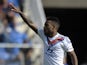 Lyon's Frecnh forward Alexandre Lacazette celebrates after scoring during the French L1 football match Montpellier vs Lyon on October 6, 2013