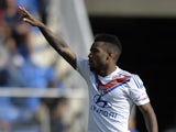 Lyon's Frecnh forward Alexandre Lacazette celebrates after scoring during the French L1 football match Montpellier vs Lyon on October 6, 2013