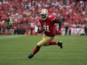 Wide receiver Anquan Boldin #81 of the San Francisco 49ers carries the ball against the Houston Texans at Candlestick Park on October 6, 2013