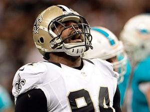 Cameron Jordan #94 of the New Orleans Saints celebrates a sack against the Miami Dolphins during a game at the Mercedes-Benz Superdome on September 30, 2013