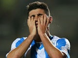 Cristian Lopez of Huddersfield Town reacts after a missed chance during the Capital One Cup third round match between Hull City and Huddersfield Town at the KC Stadium on September 24, 2013