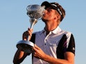 David Lynn of England poses with the trophy after winning the Portugal Masters at Oceanico Victoria Golf Course on October 13, 2013