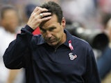Head coach Gary Kubiak of the Houston Texans scratches his head as he leaves the field after being defeated 38-13 by the St. Louis Rams at Reliant Stadium on October 13, 2013