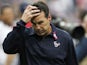 Head coach Gary Kubiak of the Houston Texans scratches his head as he leaves the field after being defeated 38-13 by the St. Louis Rams at Reliant Stadium on October 13, 2013