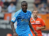 Marseille's French midfielder Giannelli Imbula runs with the ball during the L1 football match between Lorient and Marseille on September 28, 2013