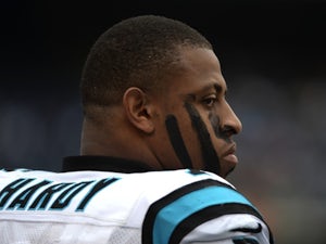 Greg Hardy of the Carolina Panthers looks onto the field during the game against the San Diego Chargers on December 16, 2012