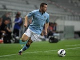 Harry Bunn of Manchester in action during a preseason friendly match between Manchester City and Al Hilal fight for the ball at Tivoli Neu on July 13, 2012