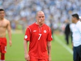 Canadian player Iain Hume leaves the field in dejection after being defeated by 8-1 in the FIFA World Cup Brazil 2014 qualifier football match against Honduars at the Olimpico Metropolitano stadium in San Pedro Sula, Honduras on October 16, 2012