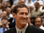 Former Utah Jazz player Jeff Hornacek looks at his framed jersey during a cerermony to retire his number on 19 November, 2002