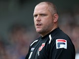 Morecambe manager Jim Bentley looks on during the Sky Bet League Two match against Northampton Town on September 28, 2013