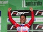Spanish Joaquim Rodriguez celebrates on the podium of the 107th edition of the Giro di Lombardia, a 242 km cycling race from Bergamo to Lecco on October 6, 2013