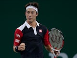 Kei Nishikori of Japan celebrates his win against Grigor Dimitrov of Bulgaria during day two of the Shanghai Rolex Masters at the Qi Zhong Tennis Center on October 8, 2013