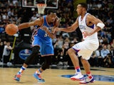 Oklahoma City Thunder forward Kevin Durant drives with the basketball during a pre-season match against the Philadelphia 76ers in Manchester on October 8, 2013