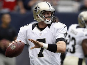 Luke McCown #7 of the New Orleans Saints throws a pass against the Houston Texans at Reliant Stadium on August 25, 2013