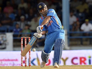 Dhoni delighted with return to form
