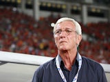 Manager Marcello Lippi of Guangzhou Evergrande looks on during the AFC Champions League Semi Final Second Round match between Guangzhou Evergrande and Kashiwa Reysol at the Tianhe Stadium on October 2, 2013