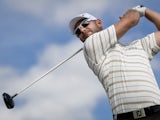 Paul Waring tees off during the third round of the Portugal Masters at Victoria Golf Course in Vilamoura on October 12, 2013