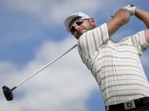 Waring surges late for two-shot lead