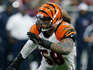 Ray Maualuga #58 of the Cincinnati Bengals runs a play during the game against the Houston Texans at Reliant Stadium on January 5, 2013 