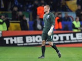Robert Green of England walks off the pitch after being sent off during the FIFA 2010 World Cup Group 6 Qualifying match between Ukraine and England at the Dnipro Arena on October 10, 2009