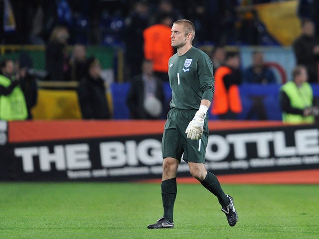 Robert Green of England walks off the pitch after being sent off during the FIFA 2010 World Cup Group 6 Qualifying match between Ukraine and England at the Dnipro Arena on October 10, 2009