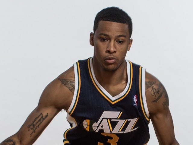 Trey Burke #3 of the Utah Jazz poses for a portrait during the 2013 NBA rookie photo shoot at the MSG Training Center on August 6, 2013