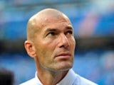 Real Madrid's French assistant coach Zinedine Zidane looks on before the Spanish league football match Real Madrid CF vs Real Betis at the Santiago Bernabeu stadium in Madrid on August 18, 2013