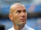Real Madrid's French assistant coach Zinedine Zidane looks on before the Spanish league football match Real Madrid CF vs Real Betis at the Santiago Bernabeu stadium in Madrid on August 18, 2013