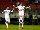 Giorgos Karagounis of Greece celebrates scoring during the group G FIFA 2014 World Cup Qualifier match against Liechtenstein on October 15, 2013
