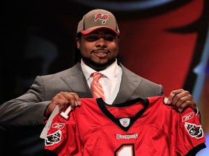 Tampa Bay's Adrian Clayborn poses on stage on stage during the 2011 NFL Draft at Radio City Music Hall on April 28, 2011