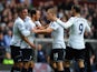 Spurs player Andros Townsend (2nd left) sheepishly celebrates his goal with team mates after opening the scoring during the Barclays Premier League match between Aston Villa and Tottenham Hotspur at Villa Park on October 20, 2013