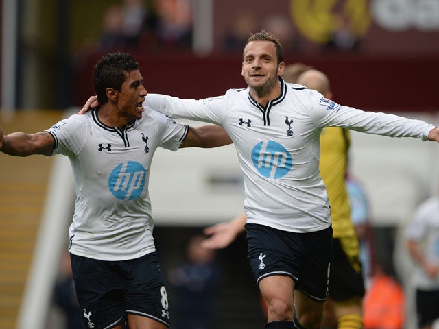 Roberto Soldado of Spurs celebrates scoring their second goal with Paulinho of Spurs during the Barclays Premier League match between Aston Villa and Tottenham Hotspur at Villa Park on October 20, 2013 
