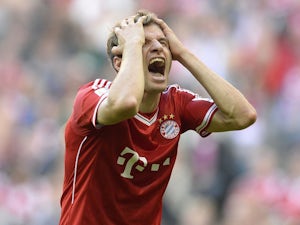 Muller plays down Bayern's chances