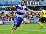 Charlie Austin Of Queens Park Rangers celebrates scoring to make it 2-1 during the Sky Bet Championship match between Millwall and Queens Park Rangers at The Den on October 19, 2013