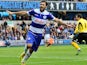 Charlie Austin Of Queens Park Rangers celebrates scoring to make it 2-1 during the Sky Bet Championship match between Millwall and Queens Park Rangers at The Den on October 19, 2013