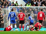 Chelsea's Cameroonian forward Samuel Eto'o scores his team's second goal during the English Premier League football match between Chelsea and Cardiff City at Stamford Bridge in west London on October 19, 2013
