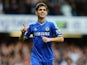 Oscar of Chelsea celebrates scoring his side's third goal during the Barclays Premier League match between Chelsea and Cardiff City at Stamford Bridge on October 19, 2013