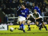 David Unsworth scores a penalty for Everton against Newcastle on November 6, 2002