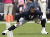 Duane Brown #76 of the Houston Texans stretches before playing the St. Louis Rams at Reliant Stadium on October 13, 2013