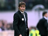 Juventus head coach Antonio Conte shows his dejection during the Serie A match between ACF Fiorentina and Juventus at Stadio Artemio Franchi on October 20, 2013
