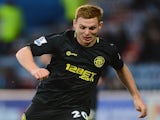 Wigan's Fraser Fyvie in action against Huddersfield Town on February 17, 2013