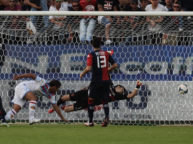 Gonzalo Bergessio of Catania scores the opening goal during the Serie A match between Cagliari Calcio and Calcio Catania at Stadio Sant'Elia on October 19, 2013