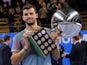 Bulgaria's Grigor Dimitrov celebrates with the trophy after winning against Spain's David Ferrer in the ATP Stockholm Open tennis tournament final match on October 20, 2013